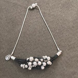 C1946 Silvertone bead and black cord adjustable bracelet